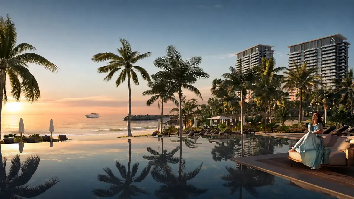 Full pool and private beach rendering at Address Residences Al Marjan Island at sunset