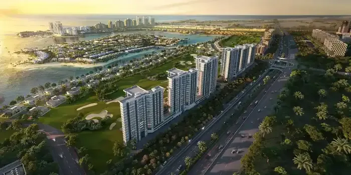 Aerial view of Al Hamra Greens beside the golf course and Al Hamra Village