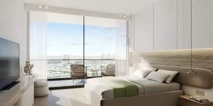 Al Hamra Greens apartment interior with floor-to-ceiling windows