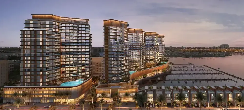 Aerial developer rendering of Al Hamra Waterfront towers and marina