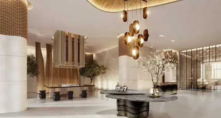 JW Marriott Residences arrival lobby with sculptural lighting and concierge-style setting