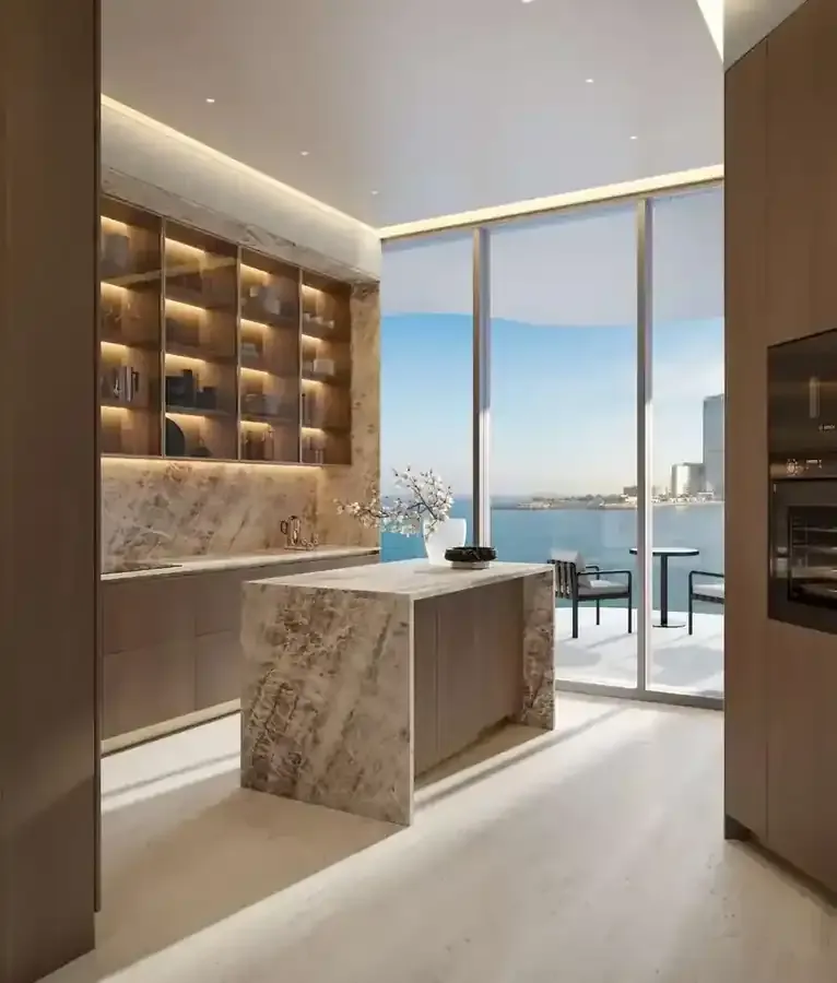 Fitted Karl Lagerfeld residence kitchen with sea-facing glazing