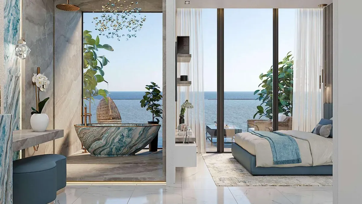 Manta Bay bedroom with panoramic glazing and sea view