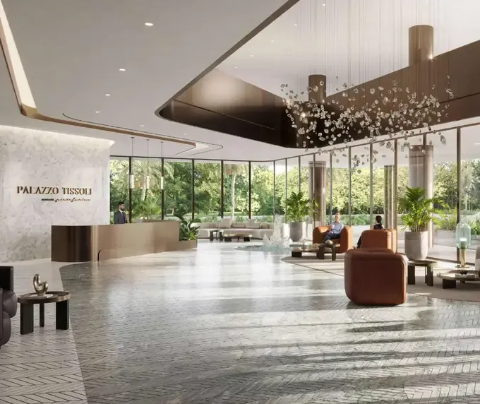 Palazzo Tissoli lobby with reception and furnished lounge seating