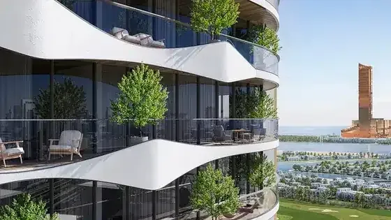 Colibri Views curved residential building with planted balconies in RAK Central